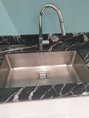 Débouchage d'un évier dans une cuisine à Lille